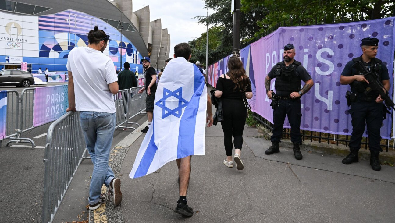 Police watch as Israel supporters arrive at the men’s soccer match between Israel and Mali at the 2024 Paris Olympics, July 24, 2024, in Paris. (Brendan Moran/Sportsfile via Getty Images)