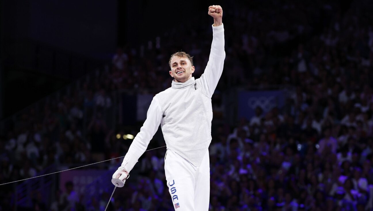 Nick Itkin celebrates winning the men’s foil individual bronze medal at the 2024 Paris Olympics, July 29, 2024, in Paris. (Al Bello/Getty Images)