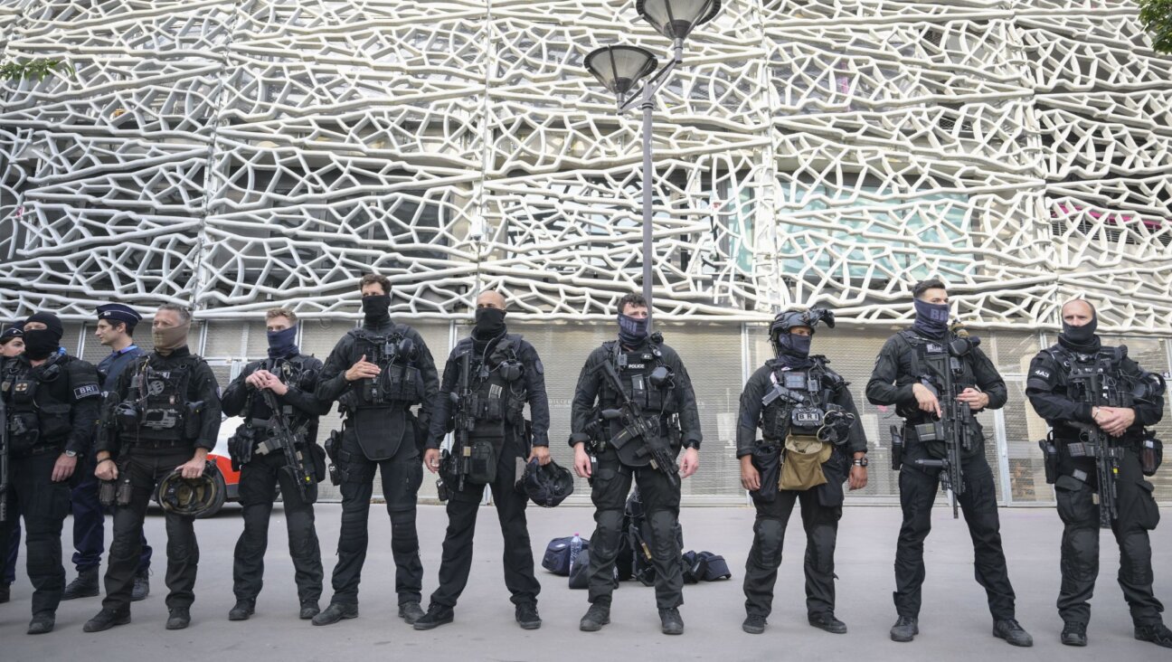 Police officers take security measures ahead of the soccer match between Mali and Israel during the 2024 Olympics, July 24, 2024, in Paris. (Mehmet Murat Onel/Anadolu via Getty Images)