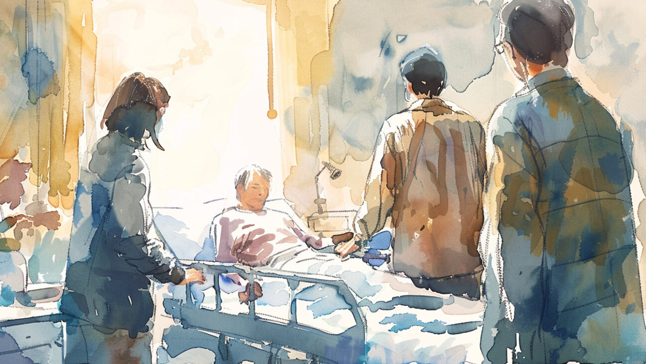 A family surrounds a loved one at their deathbed in a hospital.