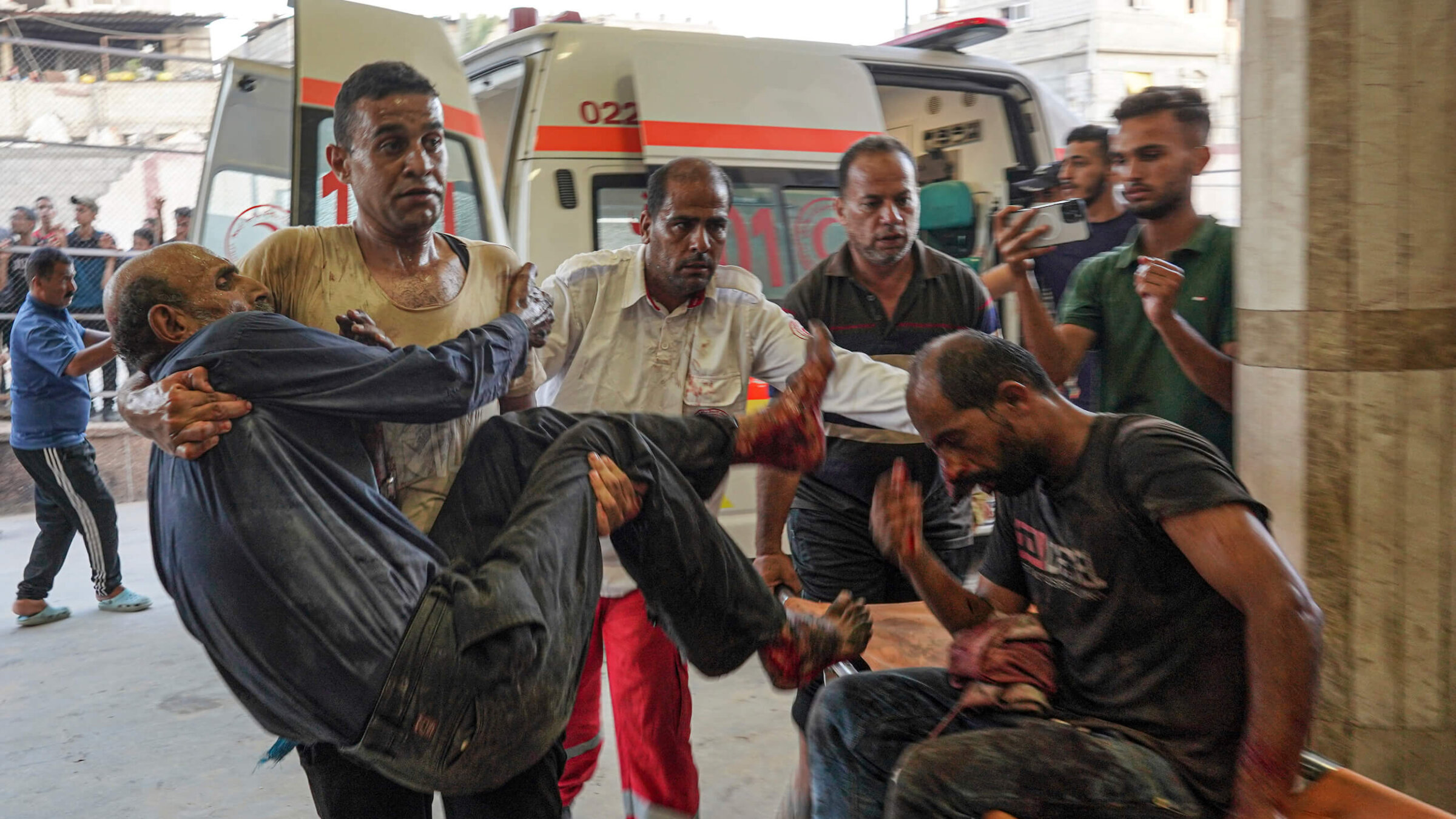 On July 9, people injured in Israeli bombings arrive at Nassr Hospital in Khan Yunis. 