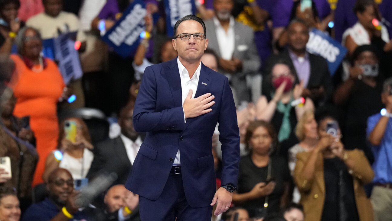 Pennsylvania Gov. Josh Shapiro greets the crowd before the start of a campaign rally with Democratic presidential candidate, U.S. Vice President Kamala Harris and Democratic vice presidential candidate Minnesota Gov. Tim Walz at Girard College, Philadelphia, Aug. 6, 2024. (Andrew Harnik/Getty Images)