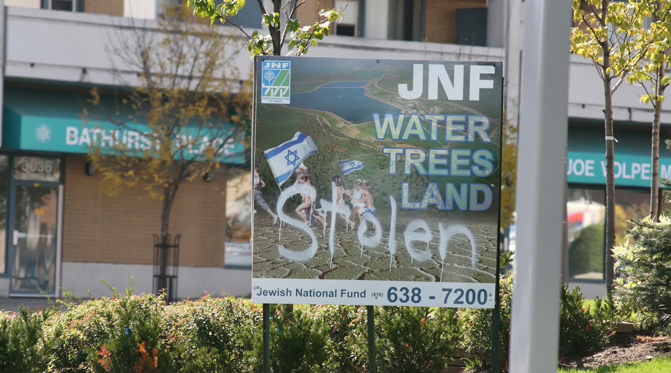 Sign for the Jewish National Fund defaced to protest the Israel activity in Gaza, in Toronto, Canada, on Oct. 9, 2008. (Creative Touch Imaging Ltd./NurPhoto)