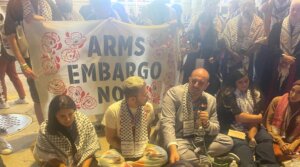 Abbas Alawieh, a leader of pro-Palestinian “Uncommitted” delegates to the Democratic National Convention, conducts a sit-in outside the United Center, Chicago, Aug. 21, 2024