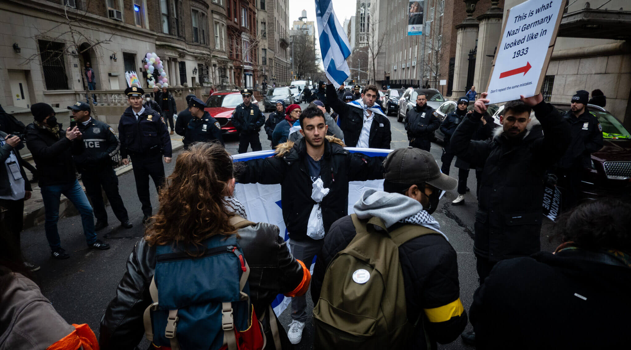 Anti-Israel activists block Jewish students from walking down a street near Columbia University, Feb. 2, 2024.