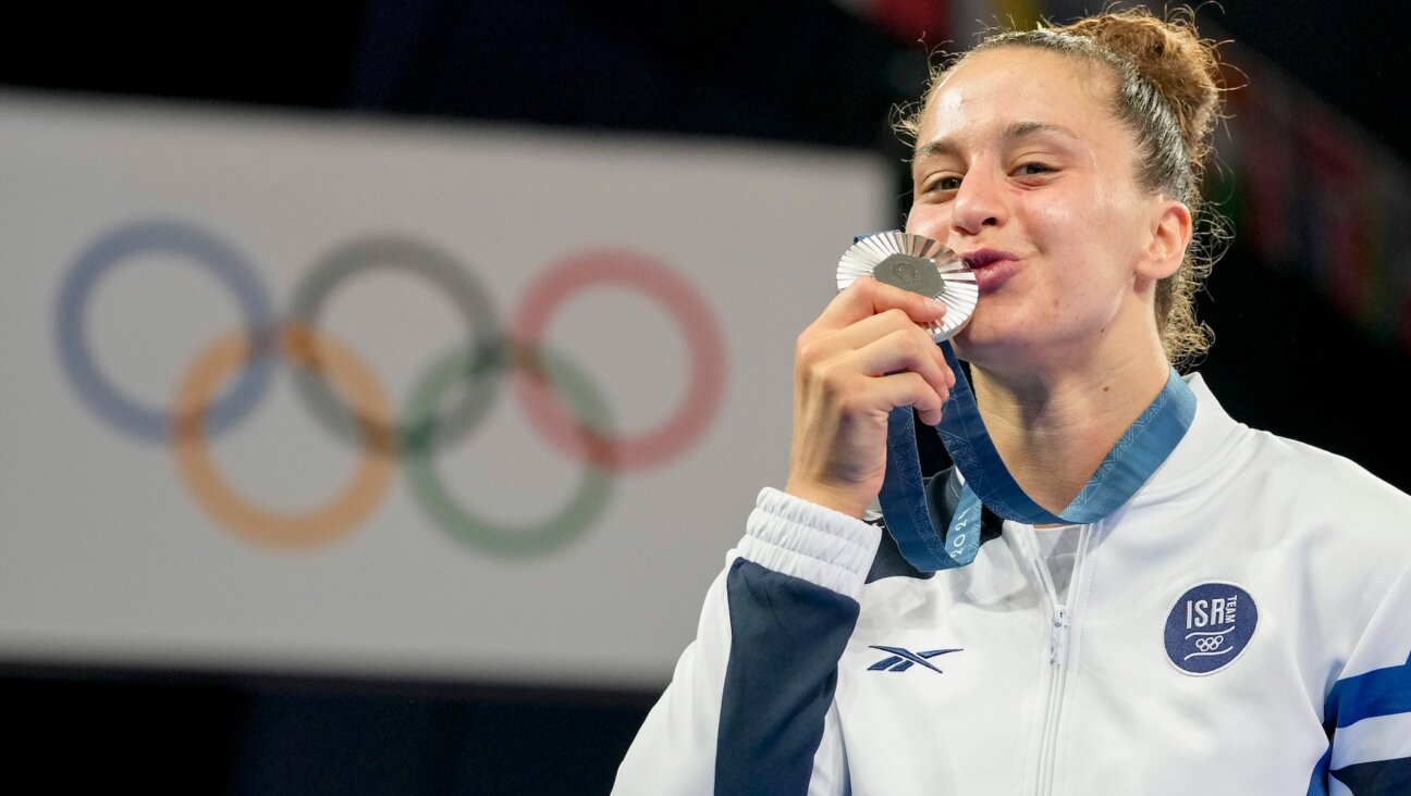 Silver medalist Inbar Lanir of Team Israel celebrates after the Women’s Judo 78-kilogram medal ceremony. (Alex Gottschalk/DeFodi Images via Getty Images)