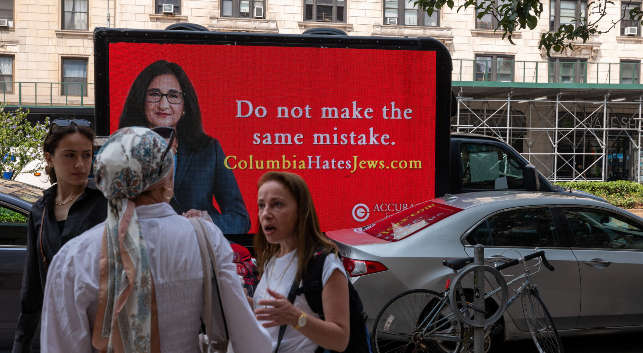 An auto billboard featuring an image of Minouche Shafik, the Columbia University president who resigned, circles the New York City campus the day after she stepped down, Aug. 15, 2024. (Spencer Platt/Getty Images)