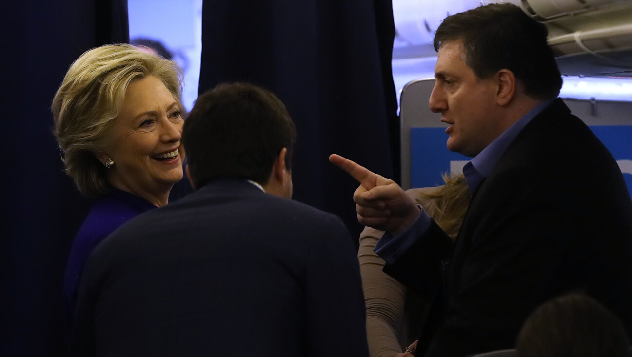 Hillary Clinton talks with Philippe Reines shortly before the 2016 presidential election, which she lost to Donald Trump.