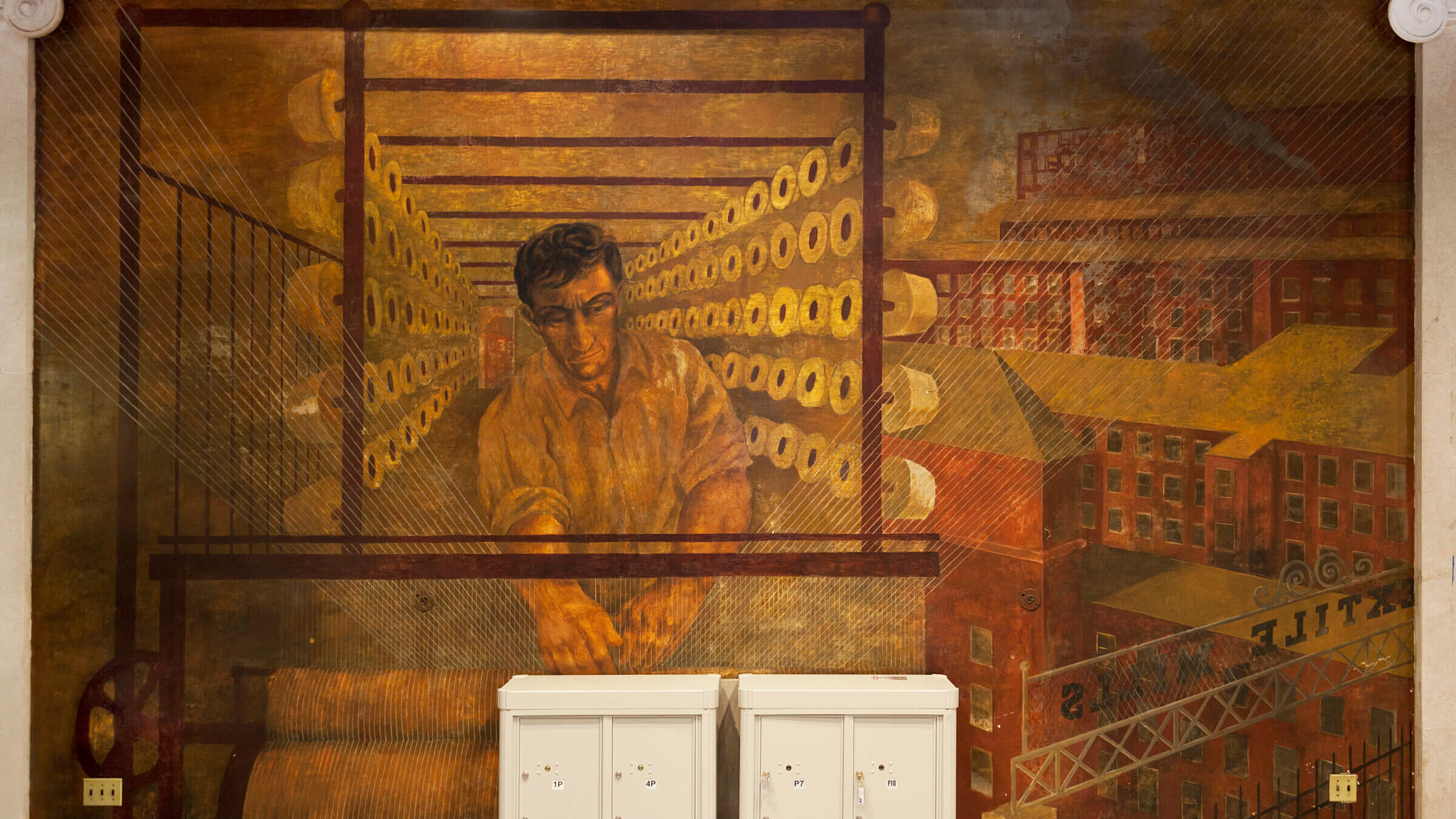 ‘Man working a mechanical loom’ in Ben Shahn’s ‘Resources of America’ mural.