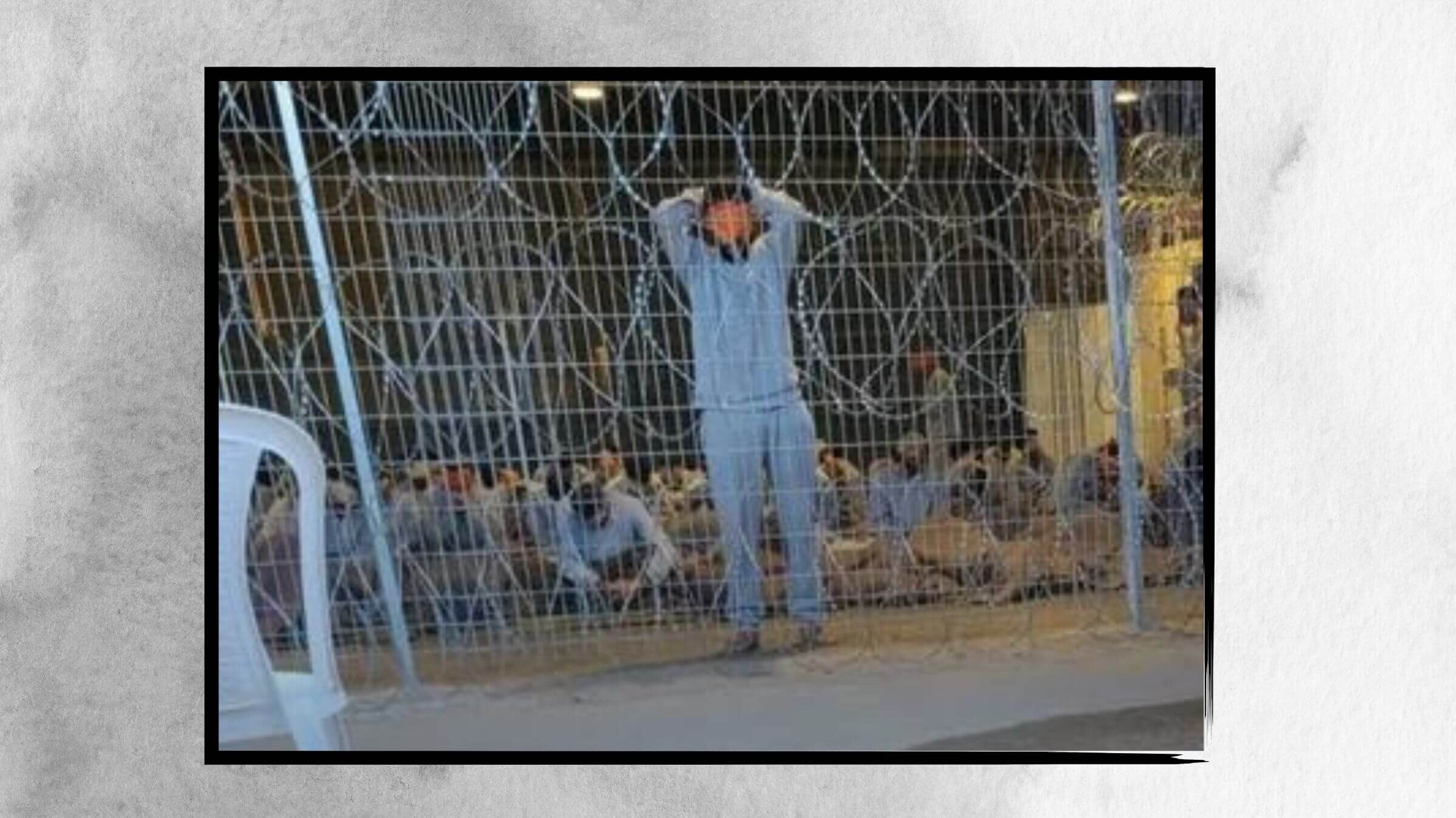 Blindfolded Palestinian detainees inside the Israeli military prison camp Sde Teiman, May 2024. 