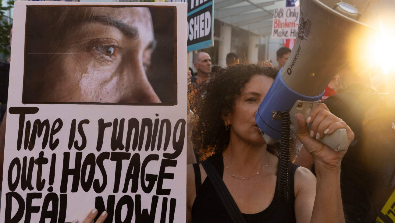 Families of hostages and supporters demonstrate outside a press event by U.S. secretary of state Antony Blinken Aug. 19 in Tel Aviv. The IDF retrieved today six more bodies of hostages killed in Gaza.