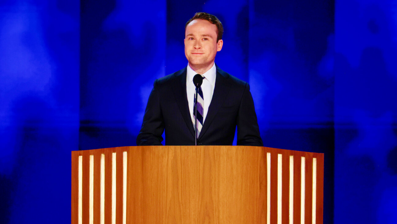 Cole Emhoff introduces his father, second gentleman Doug Emhoff, during the second day of the Democratic National Convention on Aug. 20, 2024 in Chicago.