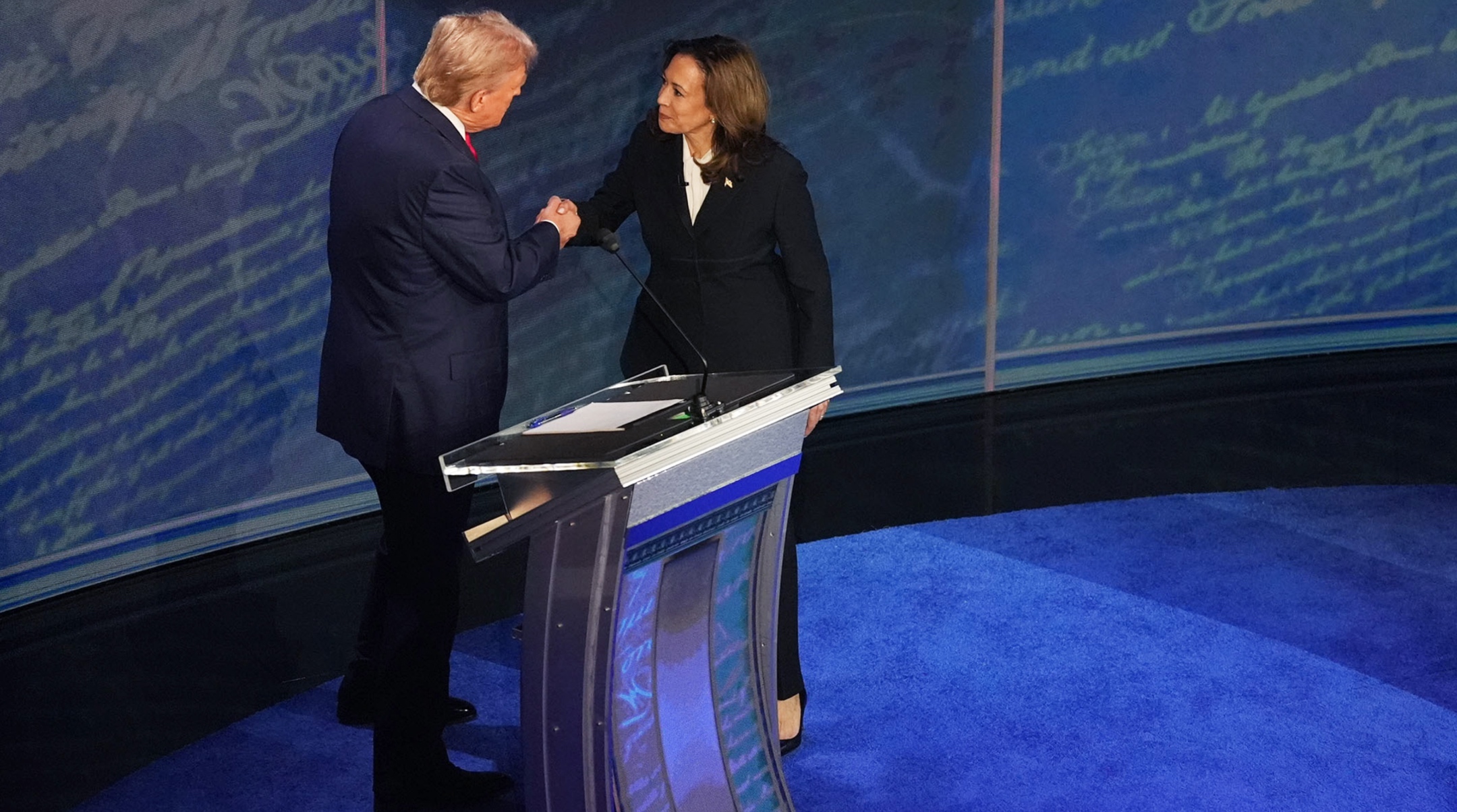 Vice President and Democratic presidential candidate Kamala Harris and former President and Republican presidential candidate Donald Trump shake hands ahead of the presidential debate at National Constitution Center in Philadelphia, Sept. 10, 2024. (Demetrius Freeman/The Washington Post via Getty Images)