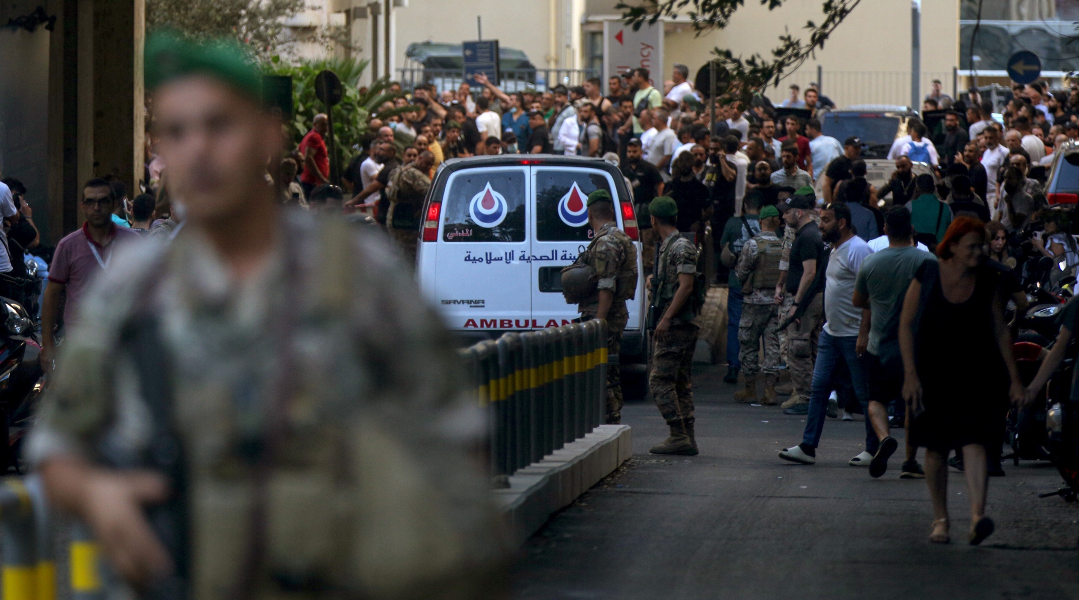 Lebanese army soldiers secure the area for an ambulance to enter the premises of the American University hospital. Eight people have been killed and some 2,750 injured in suspected coordinated explosions of hand-held telecommunications devices across Lebanon, Health Minister Firas Abiad said during a press conference in Beirut, Sept. 17. 2024. (Marwan Naamani/picture alliance via Getty Images)