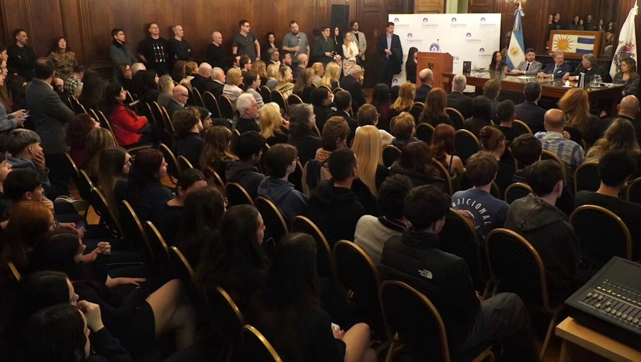 Representatives of DAIA, Argentina’s Jewish umbrella organization, present 2023 data about antisemitic incidents at Buenos Aires City Legislature, Sept. 16, 2024. (Courtesy DAIA)