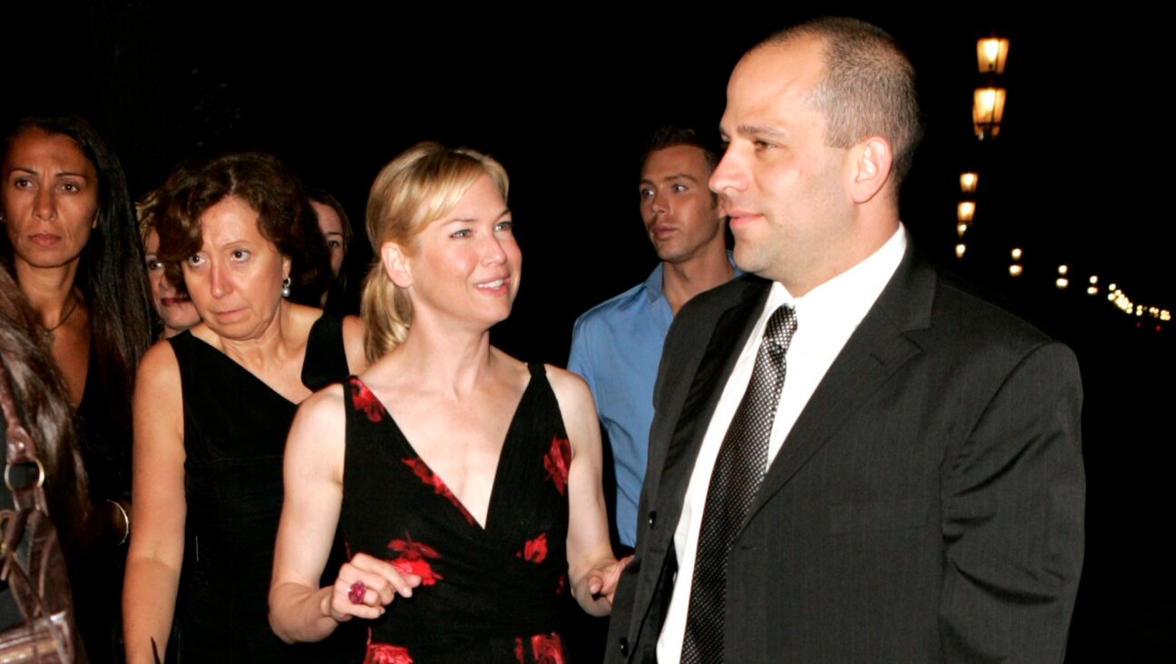 Hollywood agent Brandt Joel (right) with actor Renee Zellweger at the 2005 Venice Film Festival in Venice, Italy. (J. Vespa/WireImage)