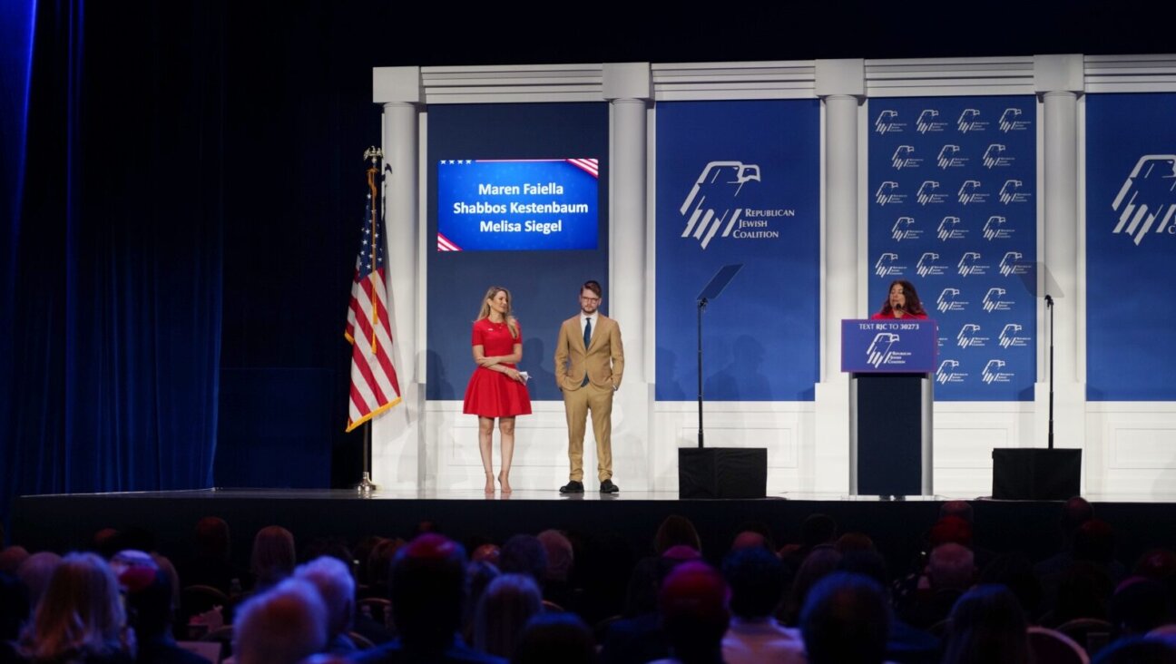 Shabbos Kestenbaum, center, on stage at the Republican Jewish Coalition’s annual convention in Las Vegas, Sept. 5, 2024. (Luke Tress)