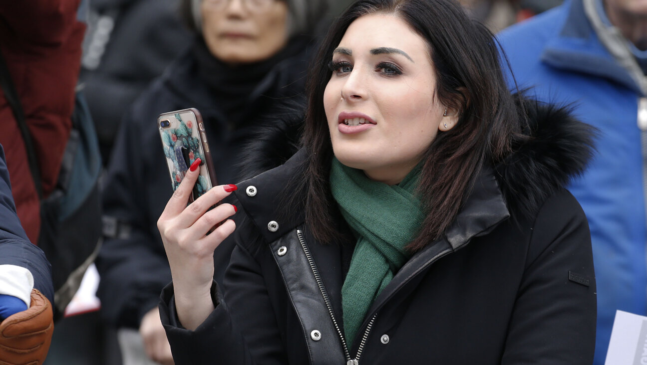 Laura Loomer stands across from the Women's March in  New York City on January 19, 2019