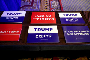 Campaign signs at the Republican Jewish Coalition's  annual conference in Las Vegas Sept. 5.