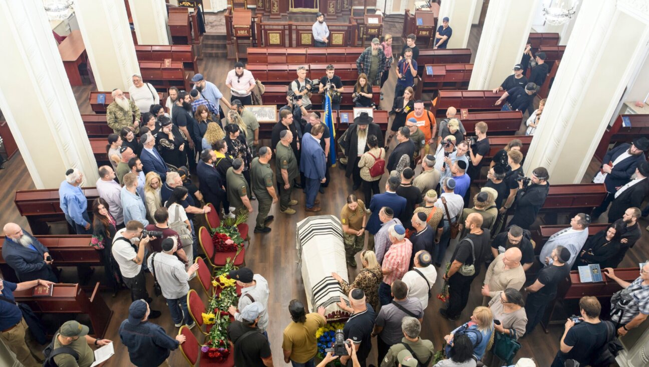 Ukrainian Jews, relatives, and friends attend the funeral for the late Ukrainian serviceman Anton (Matisyahu) Samborskyi at the Central Synagogue in Kyiv, Ukraine, Sept. 12, 2024. (Maxym Marusenko/NurPhoto via Getty Images)