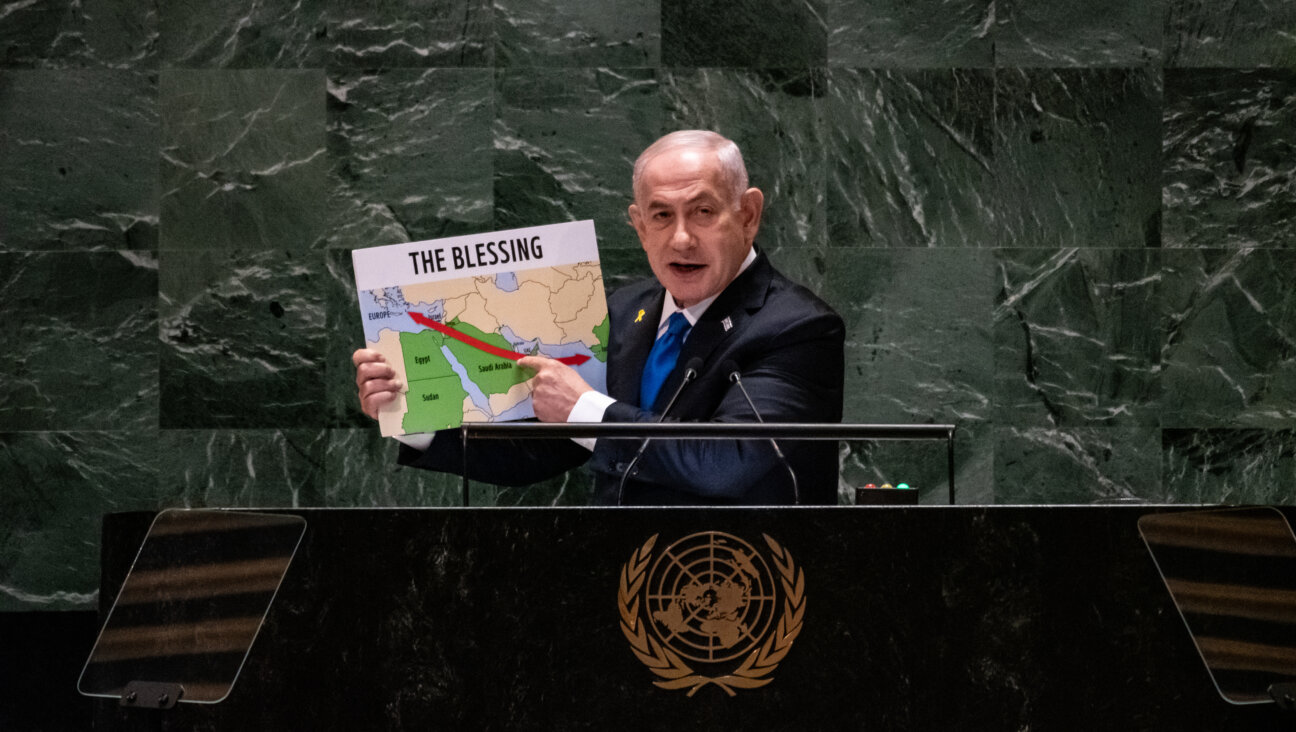 Israeli Prime Minister Benjamin Netanyahu speaks to the United Nations General Assembly on Sept. 27, 2024, presenting a map to illustrate how alliances could bring about peace in the Middle East.