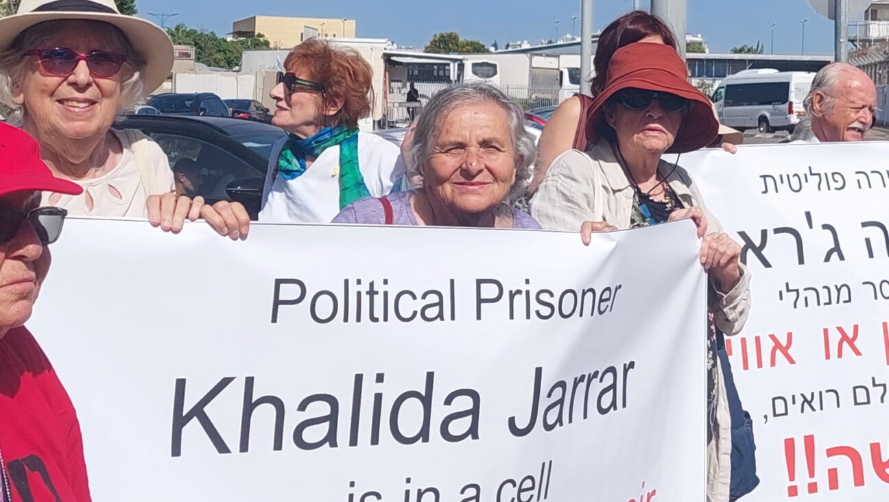 Veronika Cohen protests outside Neve Tirza prison, where Israel has indefinitely detained Palestinian legislator Khalida Jarrar.