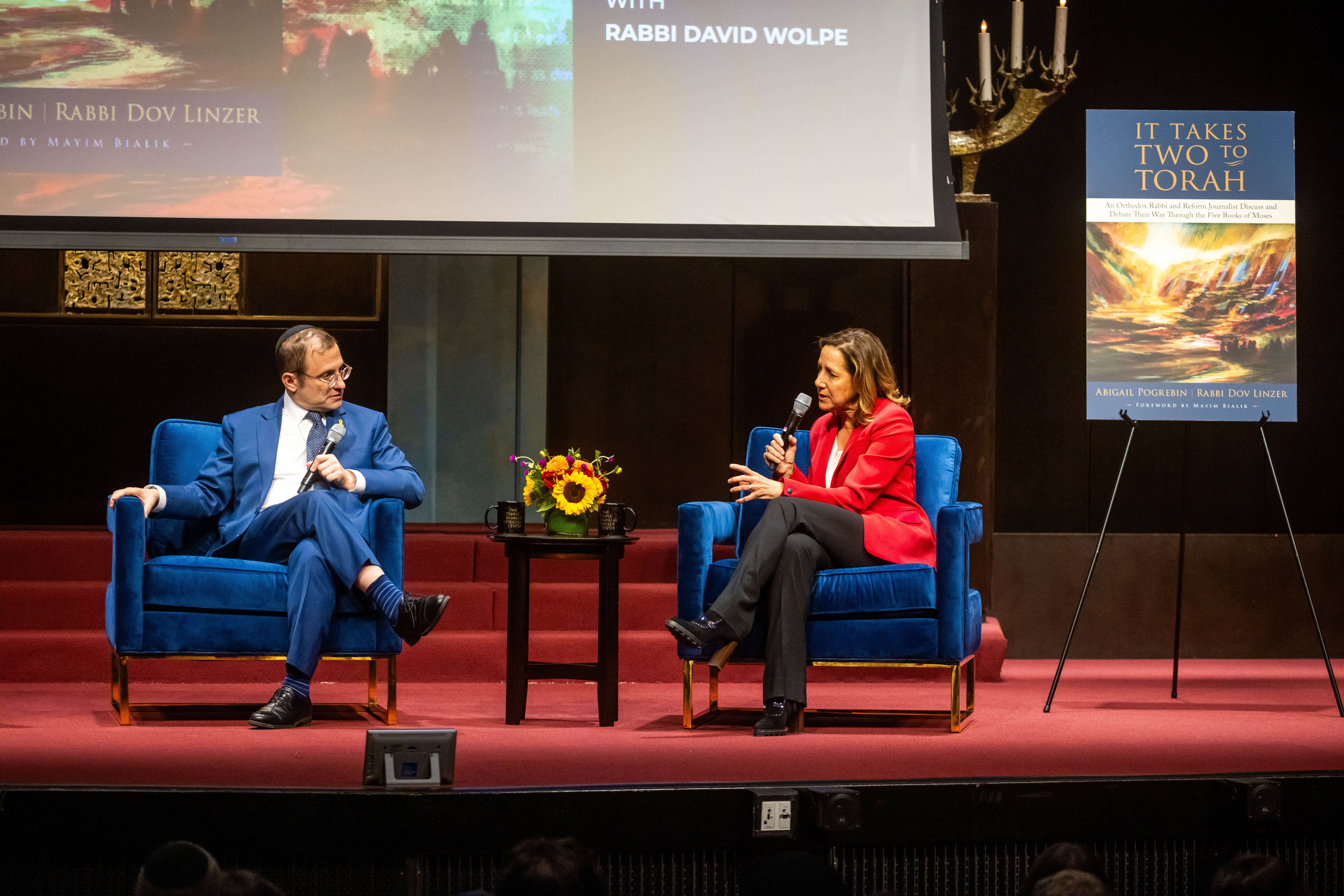 Rabbi Dov Linzer (left) and Abigail Pogrebin (right) speaking about their new book, "It Takes Two To Torah" at a launch event on Sept. 5. 