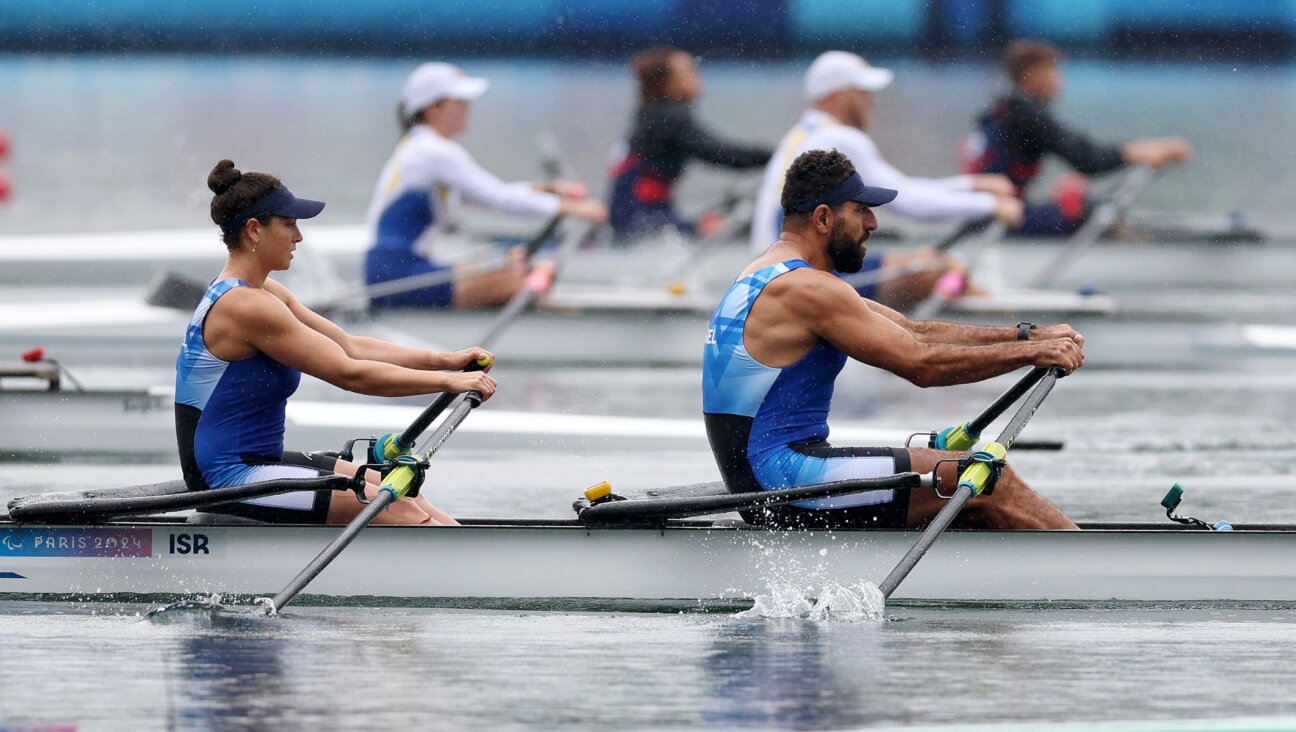 Shahar Milfelder and Saleh Shahin compete in the PR2 mixed double sculls heat at the Paris 2024 Summer Paralympic Games, Aug. 30, 2024, in Paris. (Naomi Baker/Getty Images)