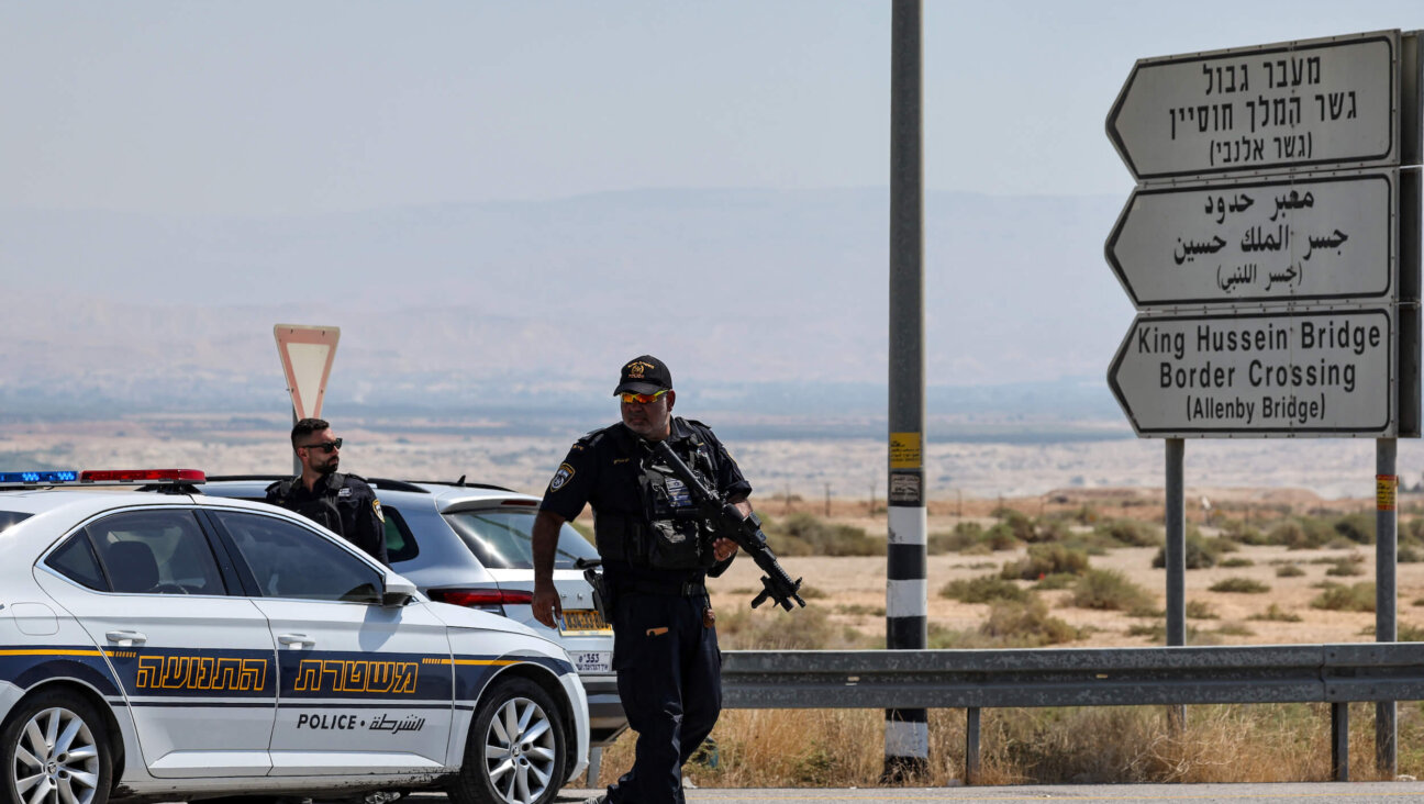 Israeli security forces gather at the scene of a reported attack near the Allenby Bridge between the occupied West Bank and Jordan on Sept. 8. 