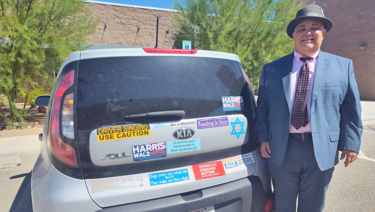 The bumper of Tony Zinman’s car is a billboard for who he is and what he cares about 