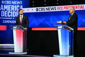 Sen. J.D. Vance (L) and Minnesota Gov. Tim Walz at the vice presidential debate on Oct. 1, 2024. 