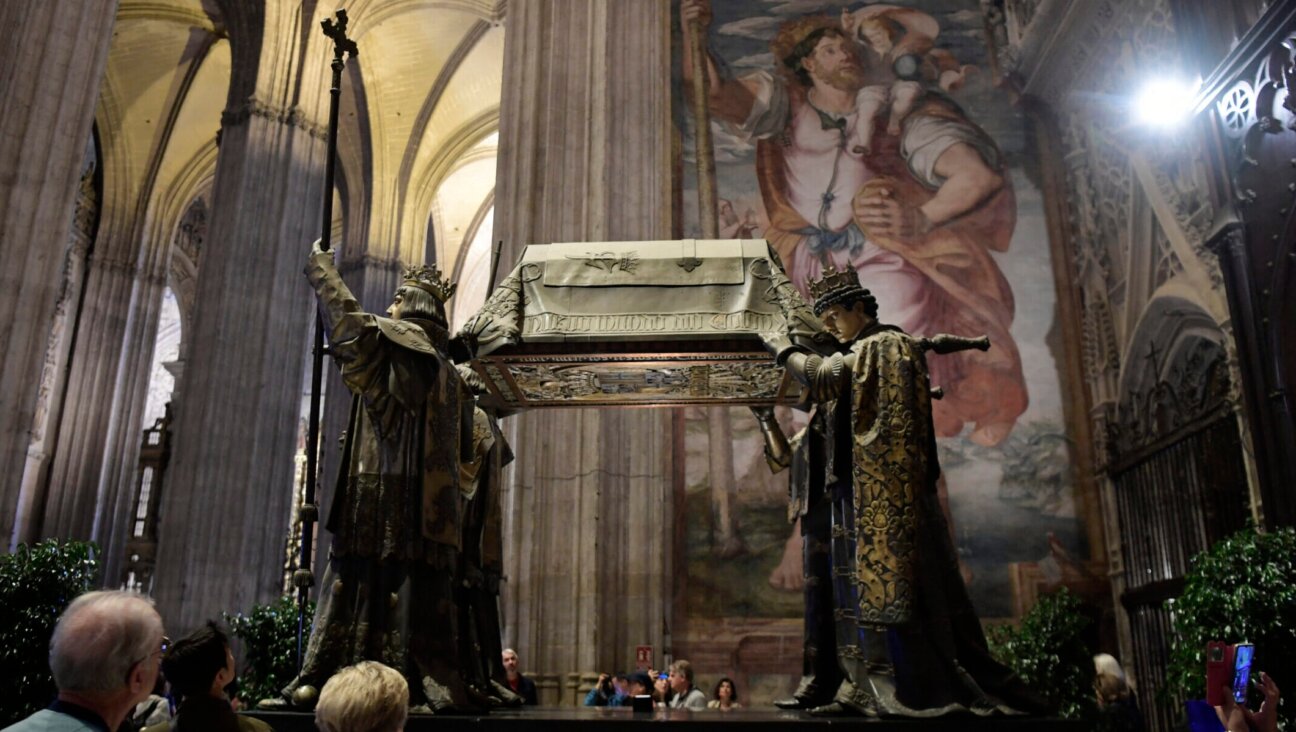 People visit the tomb of Christopher Columbus at the Cathedral of Seville, Oct. 11, 2024, shortly after forensic researchers from the University of Granada said they had confirmed that the bones buried there are in fact Columbus’. (Cristina Quicler/AFP via Getty Images)