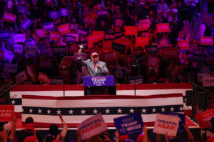 David Rem, former candidate for U.S. Congress, speaks before Donald Trump takes the stage at Madison Square Garden.