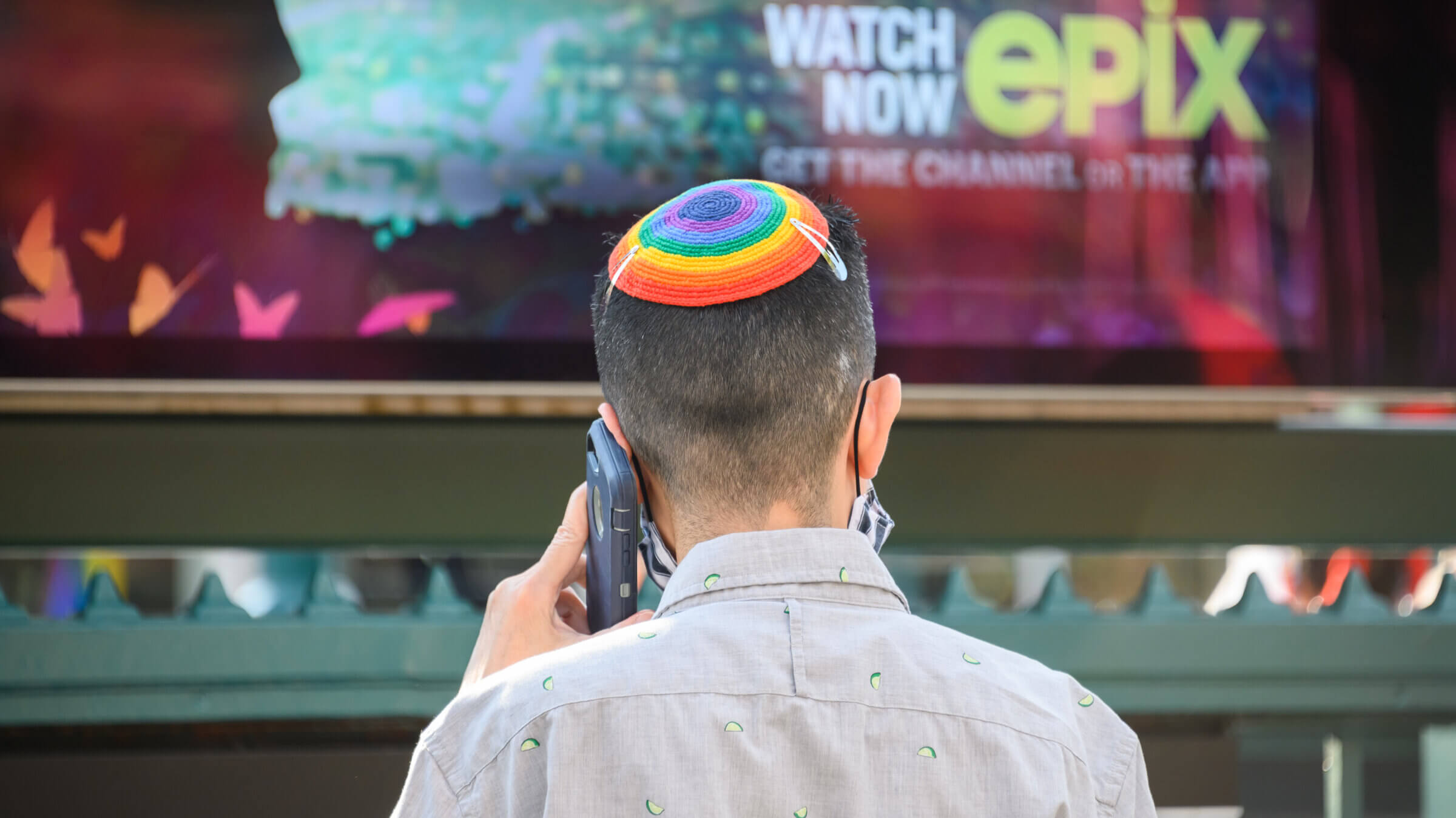 A person wears a pride themed yarmulke in the West Village on the 50th anniversary since the first march following the Stonewall Inn riots. 