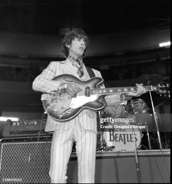 George Harrison playing Olympia Stadium in Detroit in 1966.