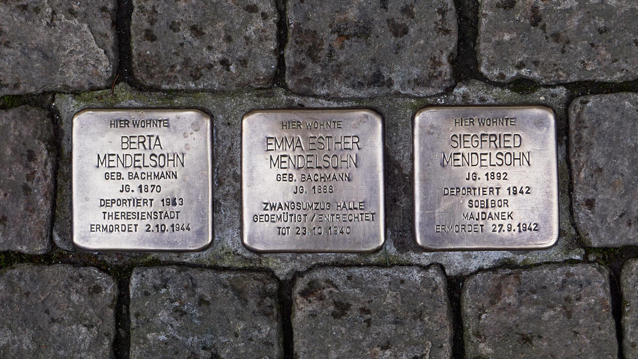 Three of the ten Stolpersteine, or stumbling stones, commemorating Jews murdered by the Nazis that appeared in Zeitz, Germany, before being stolen on October 7, 2024. (Courtesy of Sebastian Striegel)