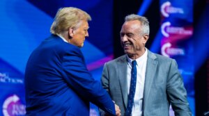 Robert F. Kennedy Jr. speaks with Republican presidential nominee former President Donald Trump at a Turning Point Action Rally in Duluth, Georgia, on Wednesday, Oct. 23, 2024. (Jabin Botsford/The Washington Post via Getty Images)