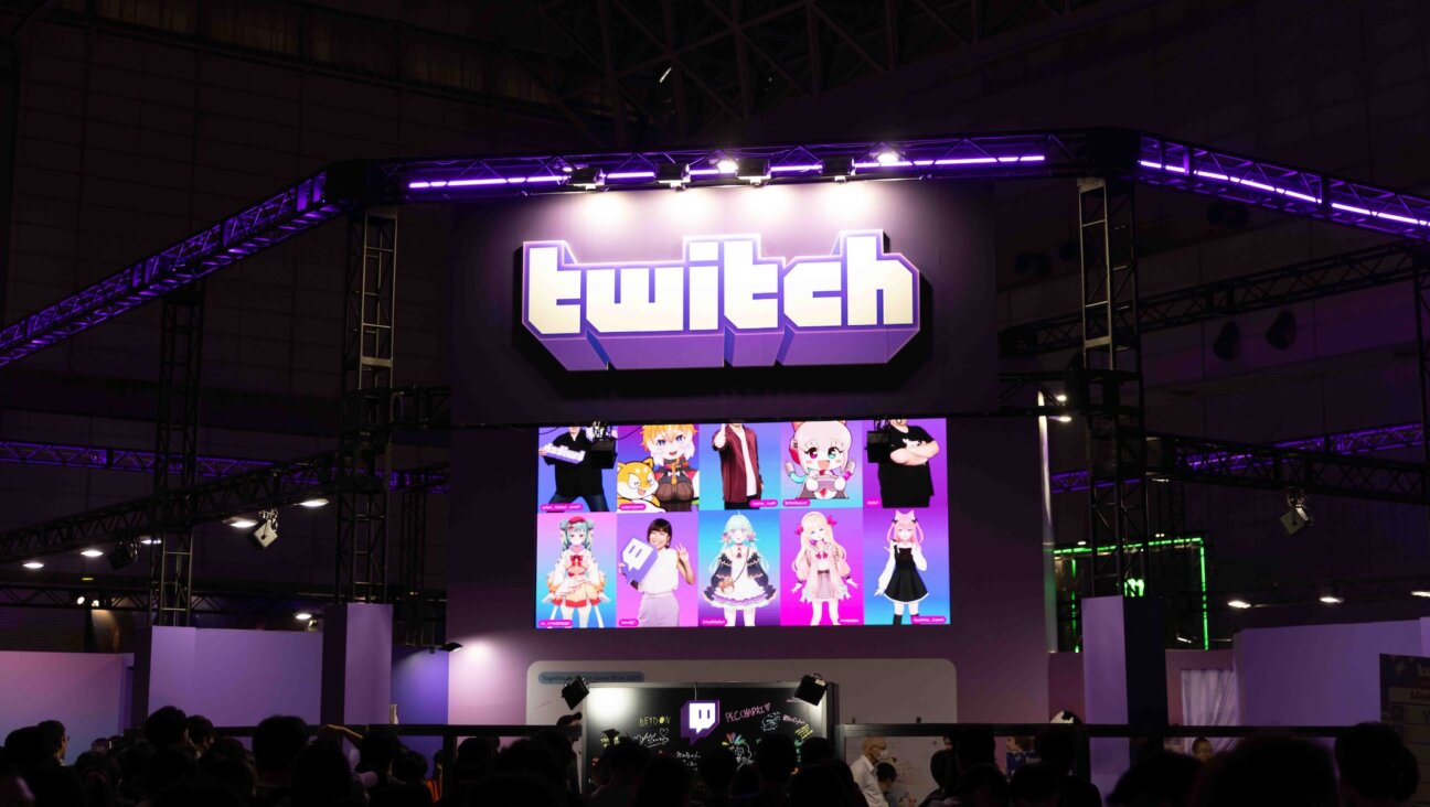 Online streaming platform Twitch branding seen at the Tokyo Game Show 2023. (Stanislav Kogiku/SOPA Images/LightRocket via Getty Images)