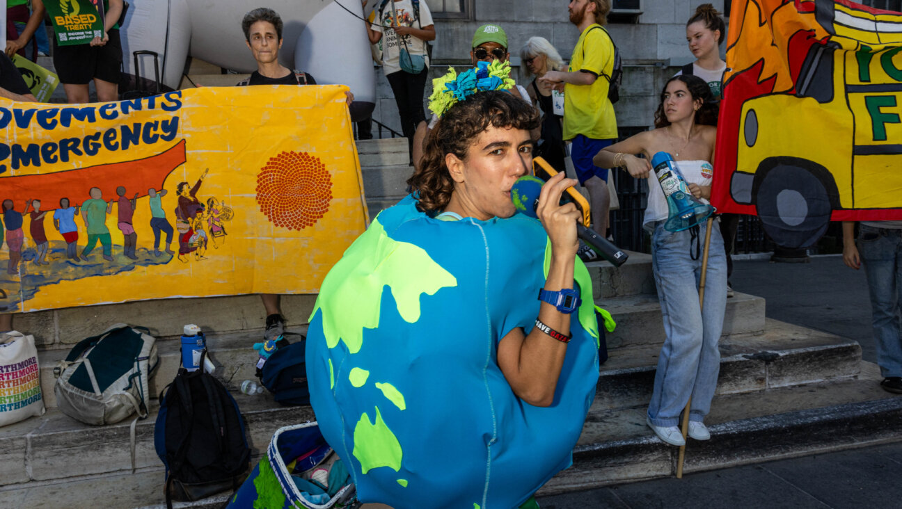 Activists call for leaders to "Tear down the pillars of fossil fuels" in front of Brooklyn Borough Hall during a Youth Global Climate demonstration ahead of the UN Climate week and General Assembly in New York City on September 20, 2024. 