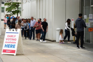 Voters head into a polling location to cast their ballots on the last day of early voting for the 2024 election on Nov. 1 in Atlanta.