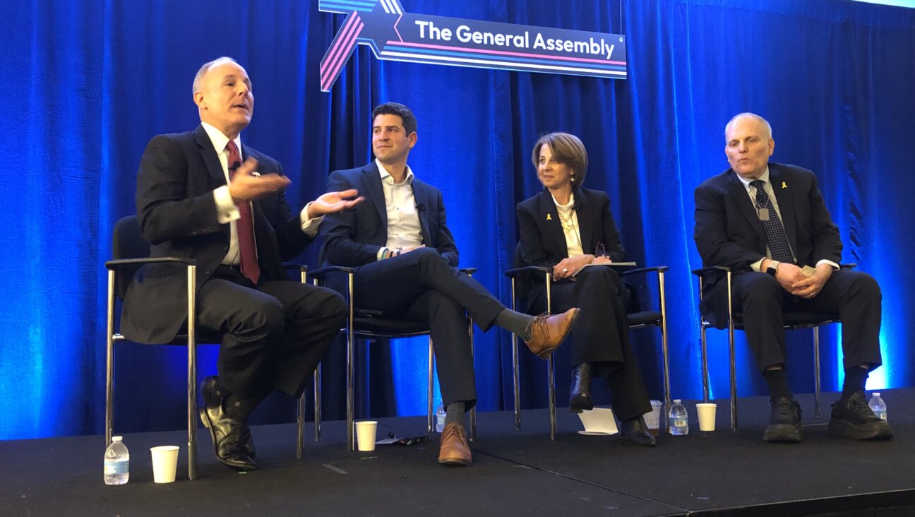 Left to right, Elan Carr, Trump's special envoy on antisemitism; Chanan Weissmann, former White House liaison to the Jewish community; moderator Liz Shrayer  and William Daroff, CEO of the conference of Presidents of Major American Jewish Organizations, discuss Jewish relations with presidential administrations on Nov. 11, 2024, at a panel organized by the Jewish Federations of North America at their annual conference in Washington, D.C.