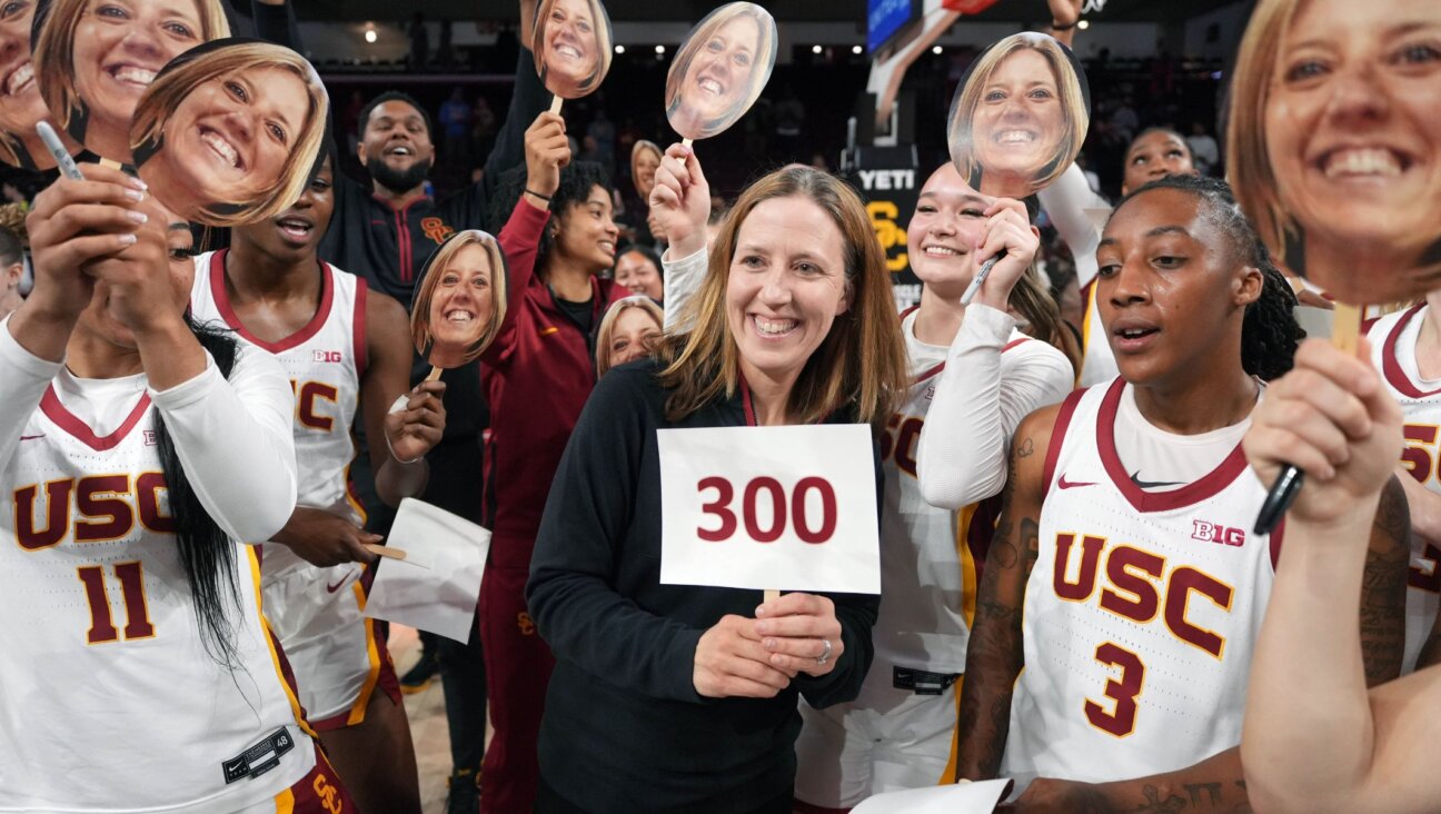 Lindsay Gottlieb celebrates her 300th head coaching victory after a 124-139 victory over the Cal State Northridge Matadors, Nov. 12, 2024, in Los Angeles. (Kirby Lee/Getty Images)