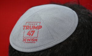 A person wears a kippah with the words "Trump 47 Jewish Leadership" during the last day of the 2024 Republican National Convention.