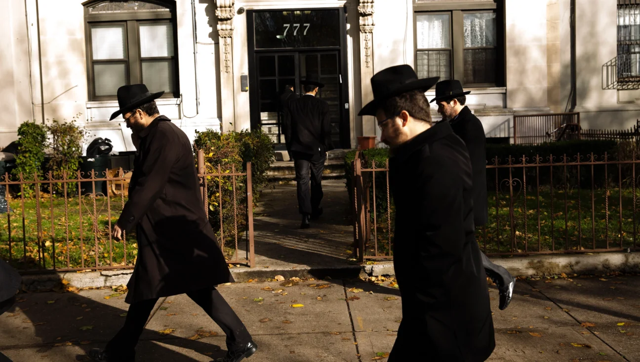 Men walking in Crown Heights, Brooklyn, in 2017.