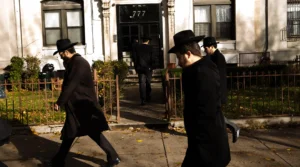 Men walking in Crown Heights, Brooklyn, in 2017.