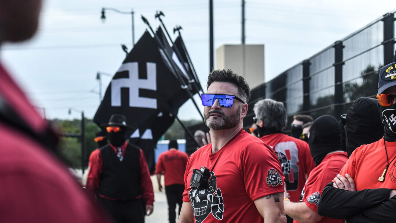 Joe Minadeo, leader of the antisemitic hate group the Goyim Defense League, rallies with another neo-Nazi group, Blood Tribe, on Sept. 2, 2023 in Orlando, Florida.