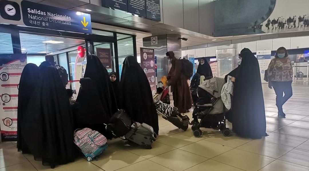 Members of the Lev Tahor sect prepare to depart from La Aurora International Airport in Guatemala City on a journey to Iraqi Kurdistan in Oct. 2021 (Courtesy)