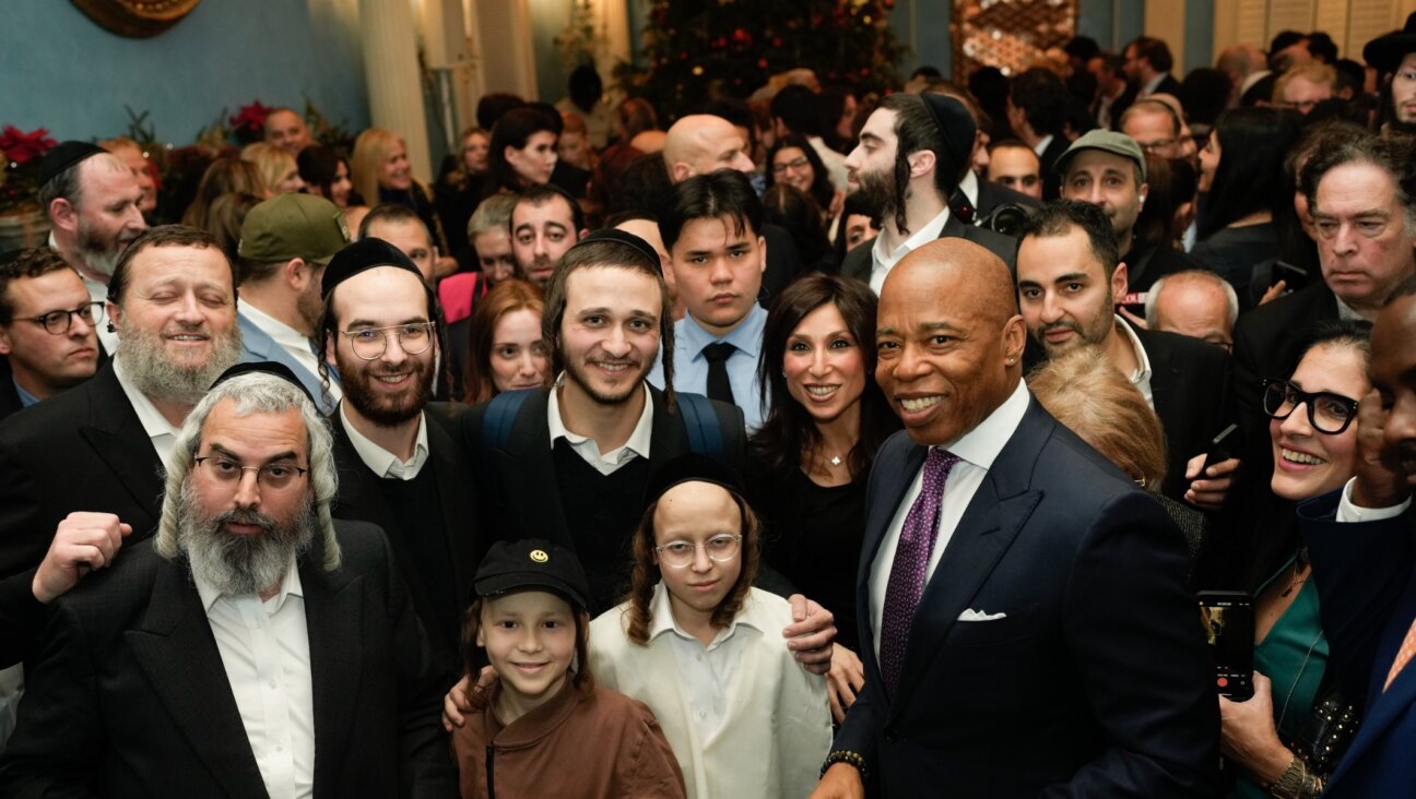 New York City Mayor Eric Adams (right) and guests at the mayor’s annual Hanukkah celebration. (Michael Appleton/Mayoral Photography Office)