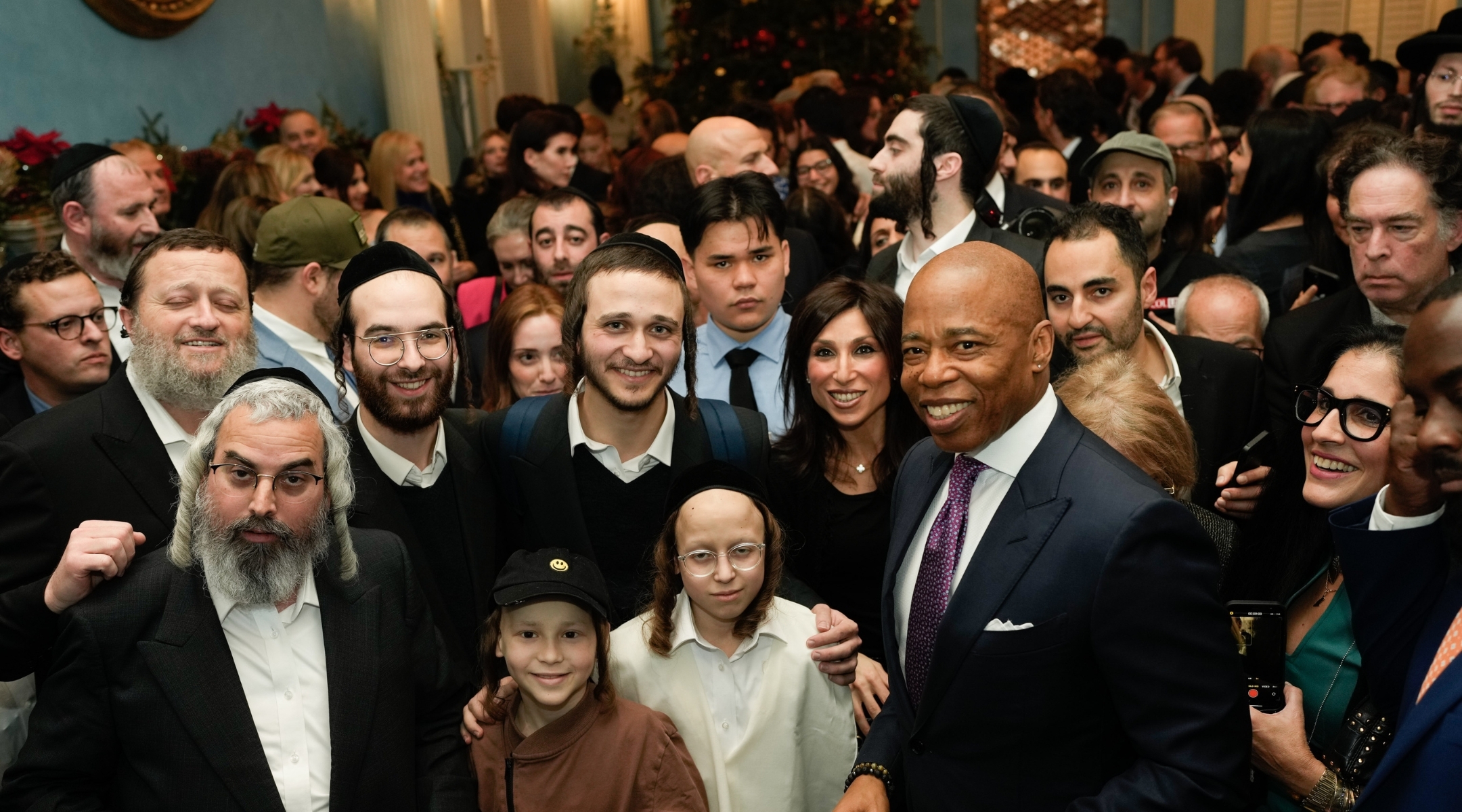 New York City Mayor Eric Adams (right) and guests at the mayor’s annual Hanukkah celebration. (Michael Appleton/Mayoral Photography Office)