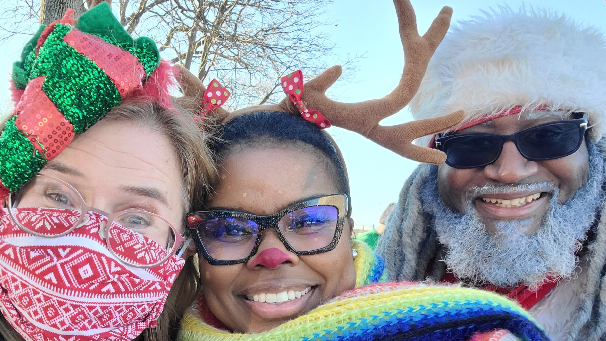 The author (center) helping distribute toys on Christmas day. 